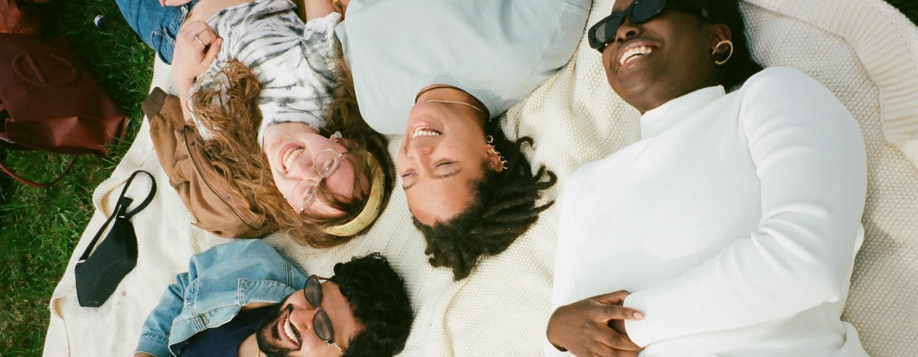 a group of people lying on the ground