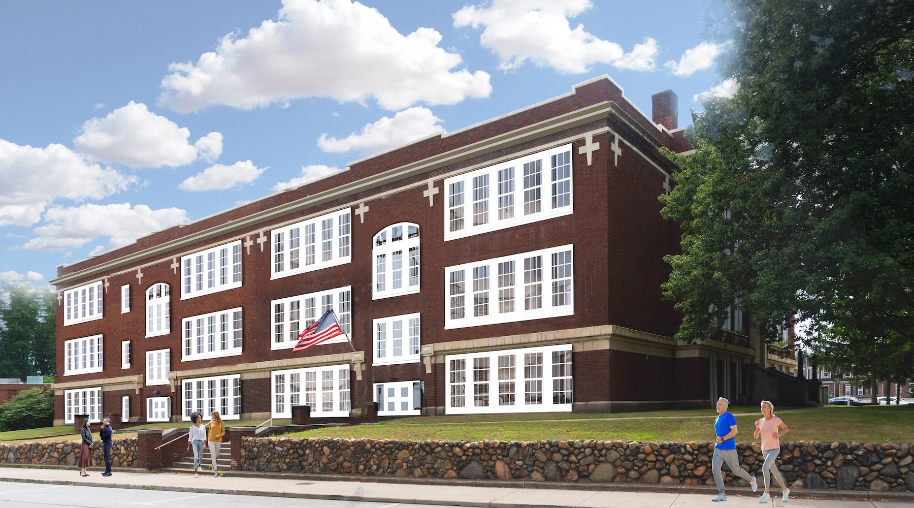 exterior of a building with people walking next to it on a sidewalk